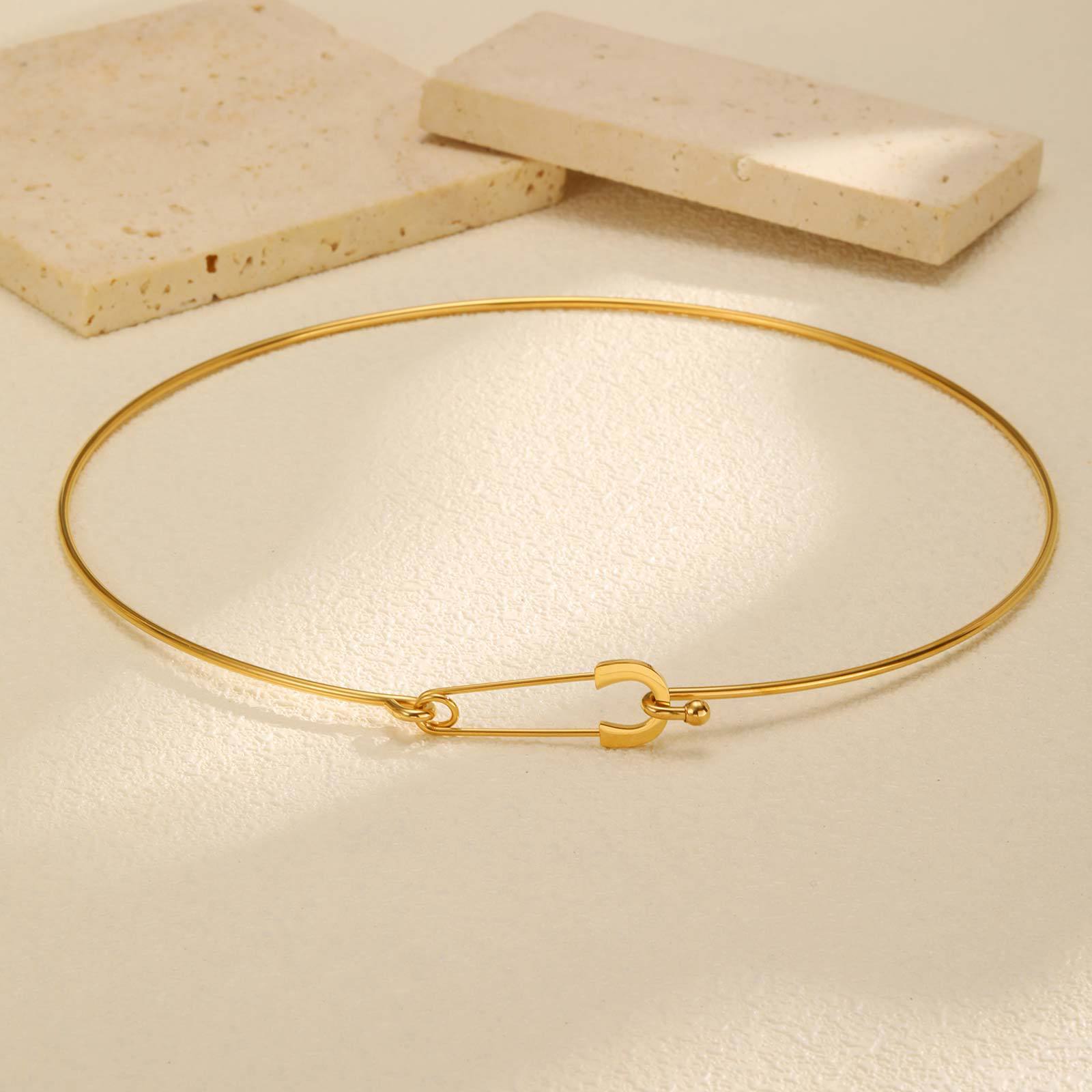 About Us 9 Minimalist safety pin gold wire day collar